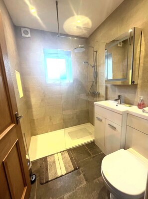 Shower, towels, soap, toilet paper - Small 3 bedroom converted stable in Norfolk (Upton)