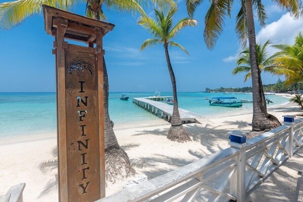 On the beach, sun loungers, beach towels