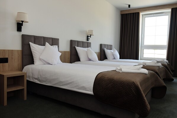 Classic Triple Room, Garden View | Desk, laptop workspace, free WiFi