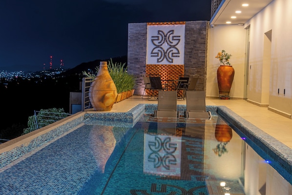 Outdoor pool, open 9:00 AM to 9:30 PM, pool umbrellas, sun loungers