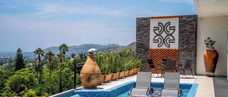 Outdoor pool, sun loungers