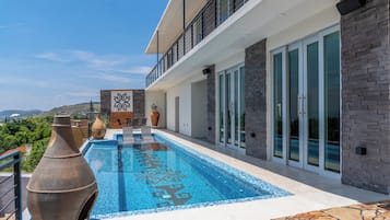 Outdoor pool, sun loungers