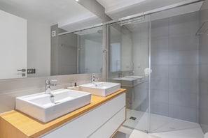 Shower, eco-friendly toiletries, hair dryer, bidet