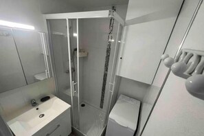 Hair dryer, towels, soap, toilet paper