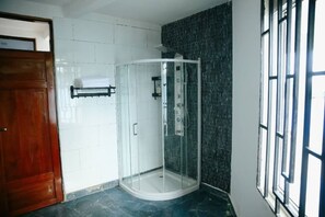 Shower, bidet, towels, soap