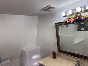 Hair dryer, towels, soap, toilet paper