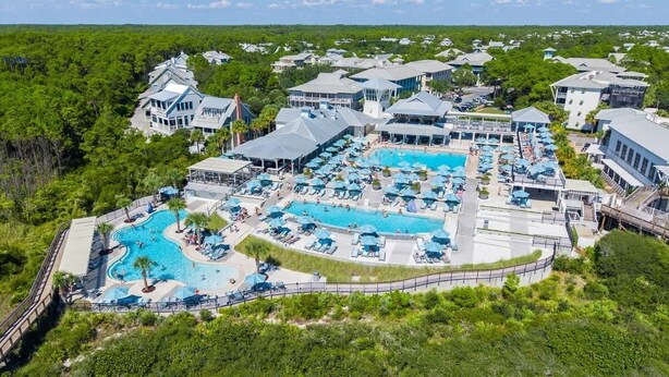 A resort with multiple swimming pools, a large lounge area, and a variety of guest accommodations. - Salt & Sunset by Stay on 30a (Watercolor)