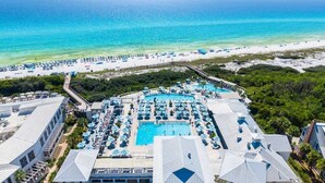 A resort with a swimming pool, beach, and ocean view. - Salt & Sunset by Stay on 30a (Watercolor)