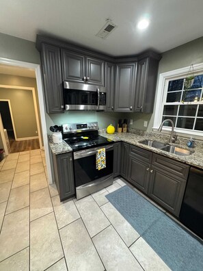 Apartment, Multiple Beds, Pool Access, Pool View (Bethany A American Retreat) | Private kitchen | Fridge, microwave, oven, stovetop