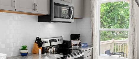 House, Multiple Beds, Patio, Garden View (Dugan Ave Both) | Private kitchen | Coffee/tea maker