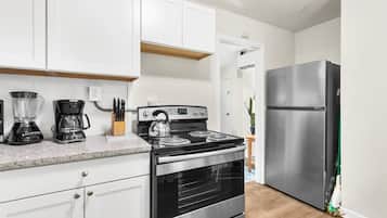 Apartment, 1 King Bed with Sofa bed, Patio (12th Ave The Bricks - Unit 4) | Private kitchen | Coffee/tea maker