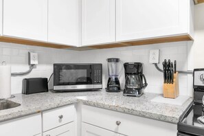 Apartment, 1 King Bed with Sofa bed, Patio (12th Ave The Bricks - Unit 4) | Private kitchen | Coffee/tea maker - 12th Ave The Bricks - Unit 4 (Birmingham)