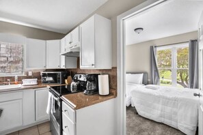 House, Multiple Beds, Pool Access, Pool View (Miami Family Friendly in Forestdale) | Private kitchen | Coffee/tea maker - Miami Family Friendly in Forestdale (Birmingham)