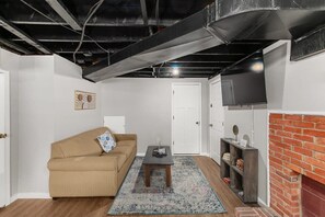 Apartment, Multiple Beds, Patio, Garden View (Broadmoor Bungalow - Unit B) | Living area | Fireplace - Broadmoor Bungalow - Unit B (Birmingham)