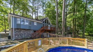 A house with a pool, wooden deck, and a stone foundation. - Valley Lake Gem (Birmingham)