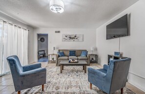 House, Multiple Beds, Patio, Garden View (Fox Hunt Hideaway) | Living area | TV, fireplace