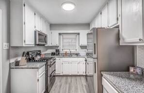 House, Multiple Beds, Patio, Garden View (Perkins Paradise) | Private kitchen | Coffee/tea maker