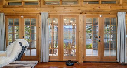 NEW! Views of Whitefish Lake, Wood Burning Fireplace, Cozy Cabin