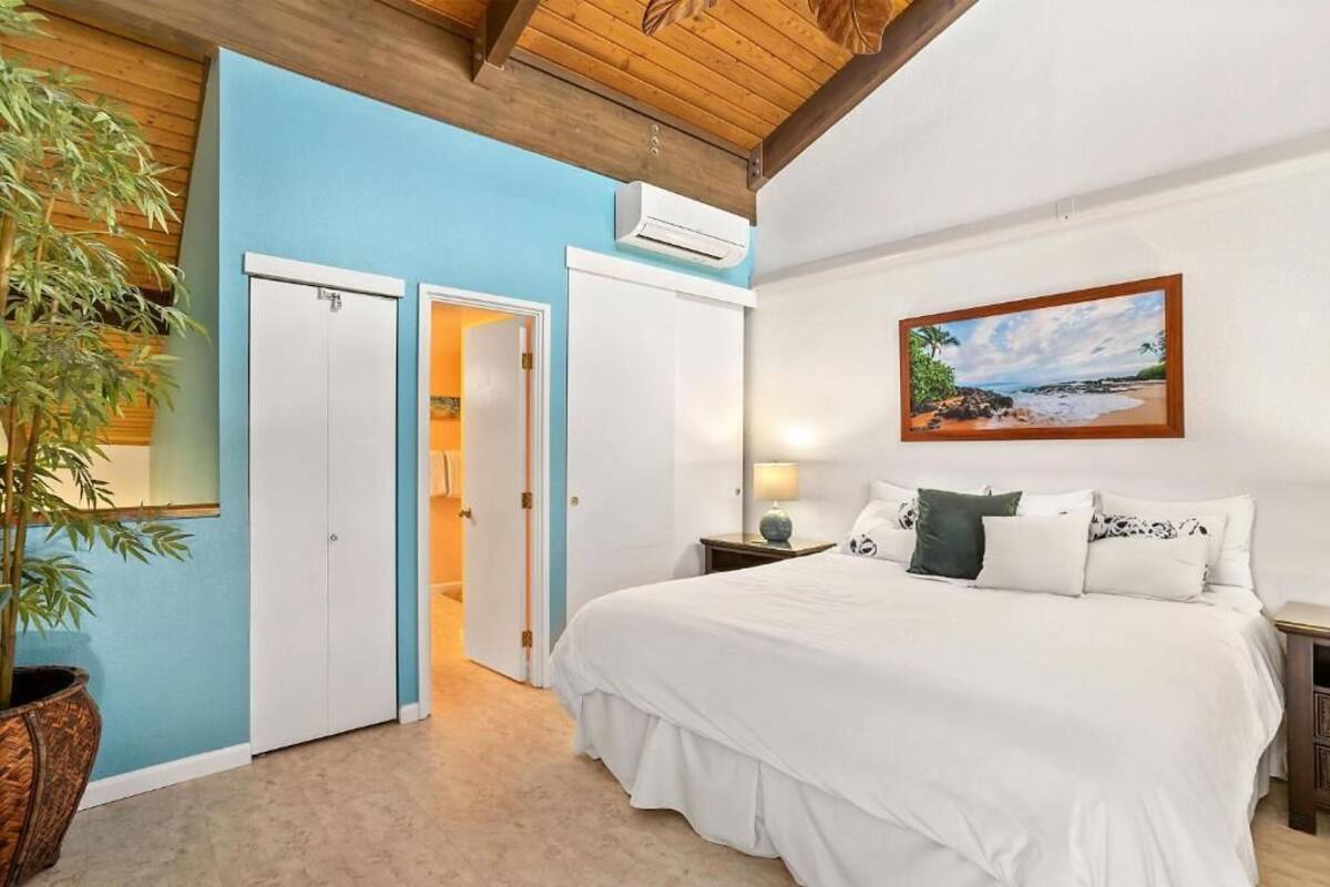 Condo, 2 Bedrooms, Lanai, Garden View | In-room safe, laptop workspace, blackout drapes, iron/ironing board