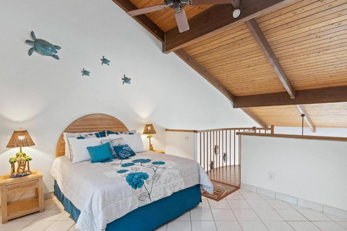 Condo, 2 Bedrooms, Lanai, Garden View | In-room safe, laptop workspace, blackout drapes, iron/ironing board