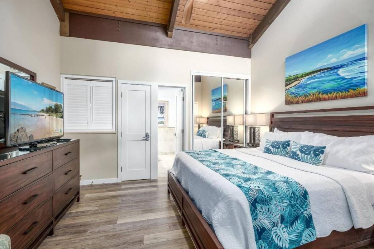 Condo, 2 Bedrooms, Lanai, Garden View | In-room safe, laptop workspace, blackout drapes, iron/ironing board