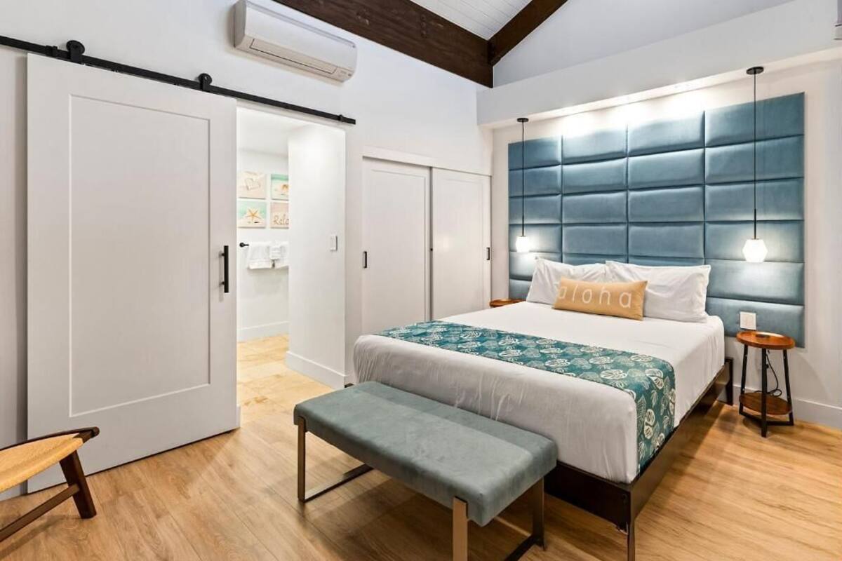 Condo, 2 Bedrooms, Lanai, Garden View | In-room safe, laptop workspace, blackout drapes, iron/ironing board