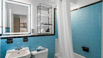 Standard Studio, 1 Queen Bed, Kitchen, Courtyard View | Bathroom | Separate tub and shower, hair dryer, towels, soap