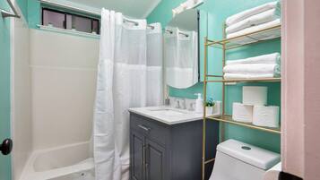 Hair dryer, towels, soap, toilet paper