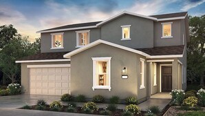 A two-story house with a garage, a front porch, and a landscaped garden. - Large new construction 3-bedroom near Hospital Hub (Bakersfield)