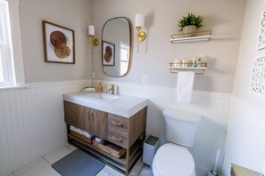 Hair dryer, towels, soap, toilet paper