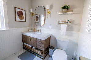 Hair dryer, towels, soap, toilet paper