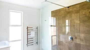 Hair dryer, towels, shampoo, toilet paper