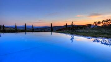 Indoor pool, seasonal outdoor pool, pool umbrellas, sun loungers