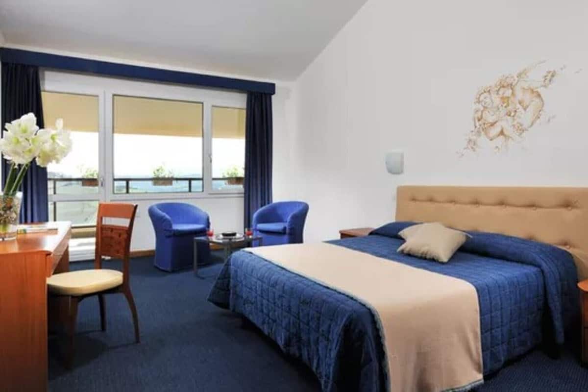 In-room safe, desk, laptop workspace, blackout curtains