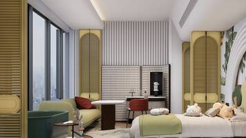 Habitación individual familiar | Artículos del minibar gratis y escritorio