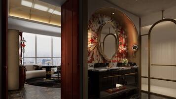 Glowing Colors Bathtub King Room | Bathroom | Deep soaking tub, rainfall showerhead, designer toiletries, hair dryer