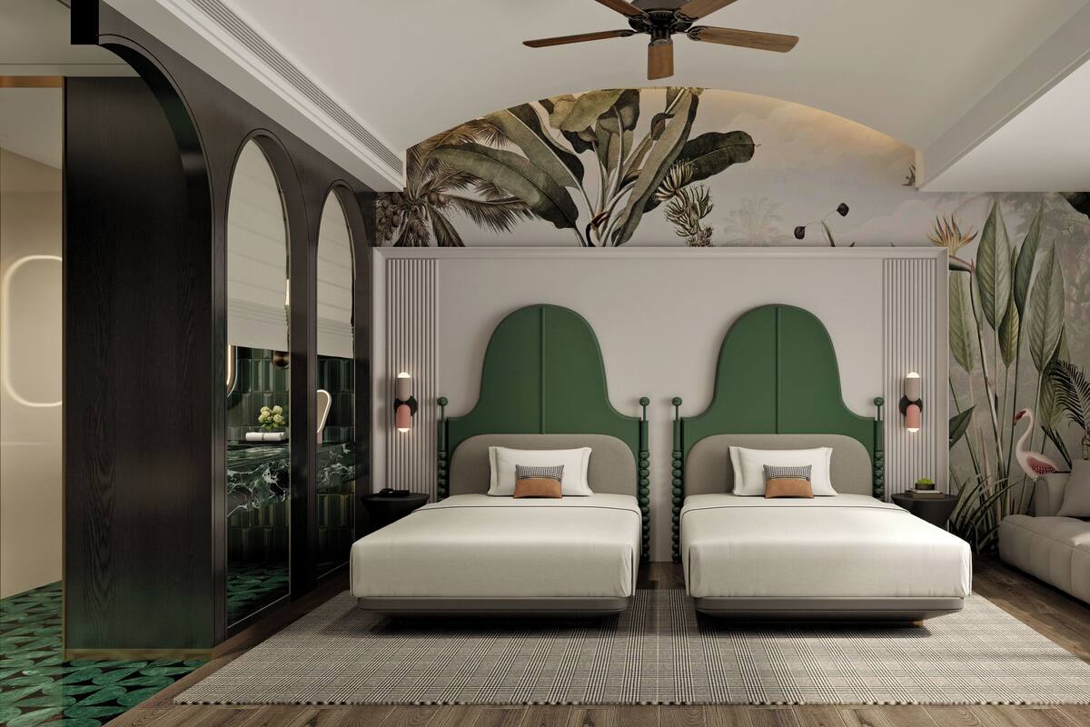 Signature tweepersoonskamer | Een gratis minibar, een bureau, een laptopwerkplek, gratis wifi