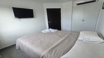 Apartment, Balcony, City View | In-room safe, iron/ironing board, free WiFi