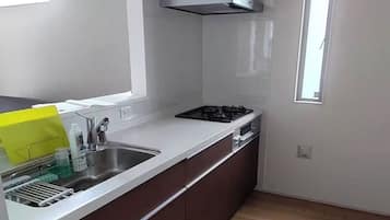 Fridge, microwave, stovetop, cookware/dishes/utensils