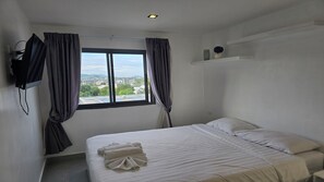Apartment, Balcony, City View | In-room safe, iron/ironing board, free WiFi