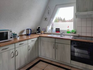 Microwave, oven, stovetop, coffee/tea maker