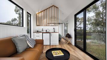 Cabana superluxo, 1 cama King, vista para o vinhedo | Área de estar