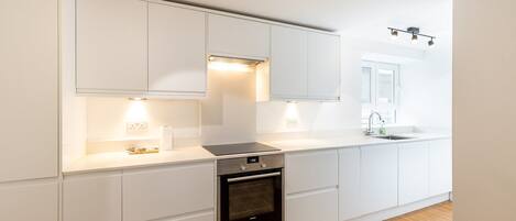 Fridge, oven, dishwasher, coffee/tea maker