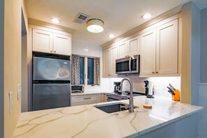 Fridge, microwave, dishwasher, coffee/tea maker