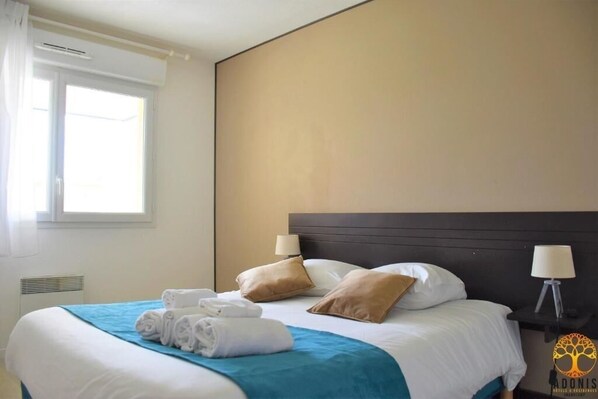 1 dormitorio, tabla de planchar con plancha, wifi gratis y ropa de cama