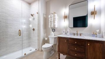 Shower, eco-friendly toiletries, hair dryer, towels