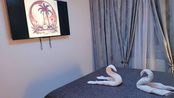 1 habitación, tabla de planchar con plancha, wifi y ropa de cama