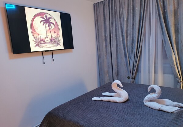 1 habitación, tabla de planchar con plancha, wifi y ropa de cama 