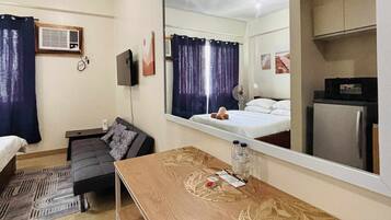 1 dormitorio, tabla de planchar con plancha, Internet y ropa de cama