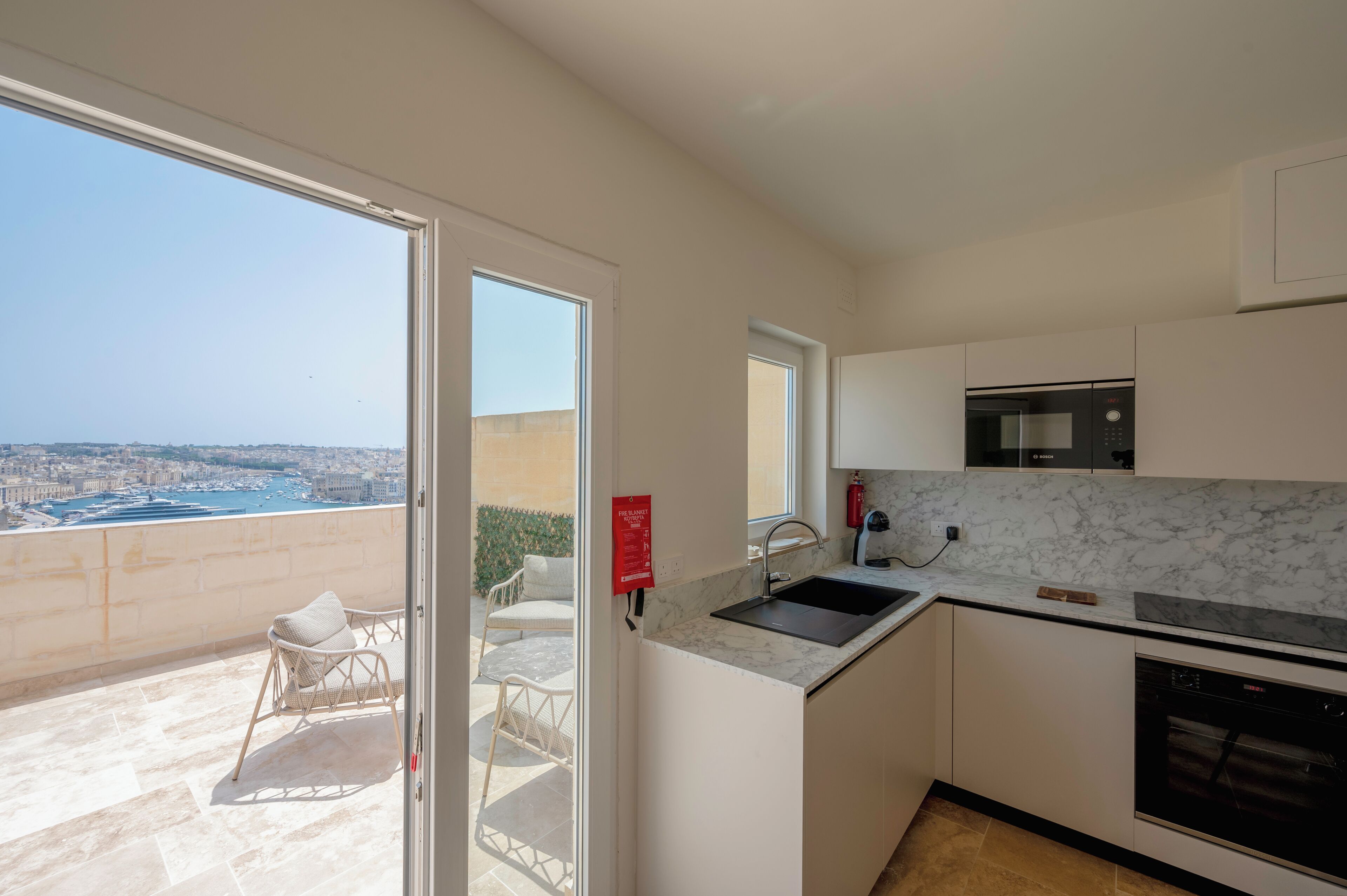 Luxury Duplex, Harbour View, Sea Facing | Private kitchen | Mini-fridge, microwave, stovetop, dishwasher